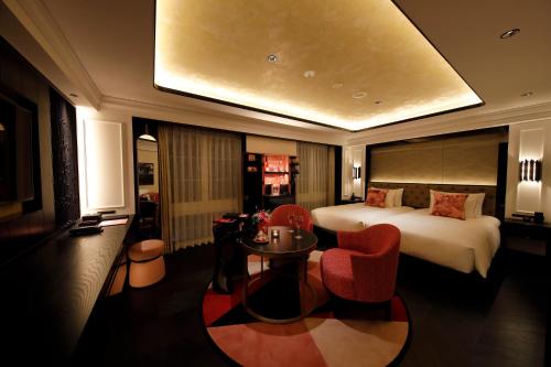 Postel nebo postele na pokoji v ubytování Fauchon Hotel Kyoto