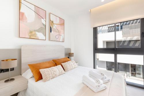 En eller flere senge i et værelse på Mirador Laias Home