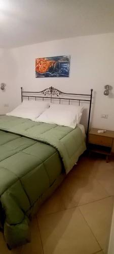 a bedroom with a bed in a room at Casa Paola in Monti