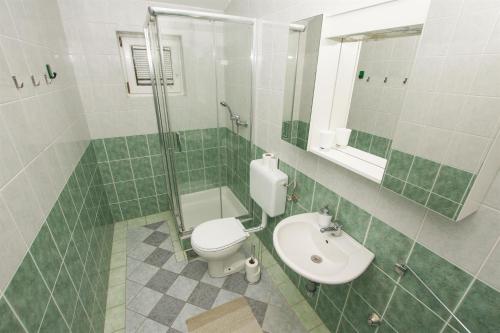 Kúpeľňa v ubytovaní Apartments Josip