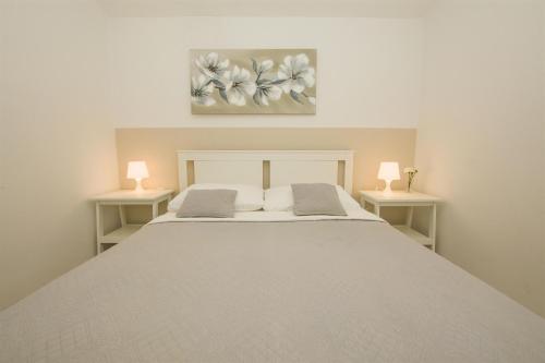 Posteľ alebo postele v izbe v ubytovaní Apartments Josip