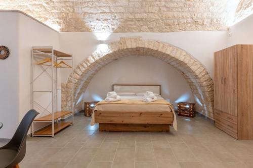 Una cama o camas en una habitación de La Pizzicata