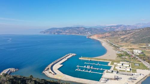 an aerial view of a beach with a marina at Halil Aslan Taysas Nova in Gazipasa