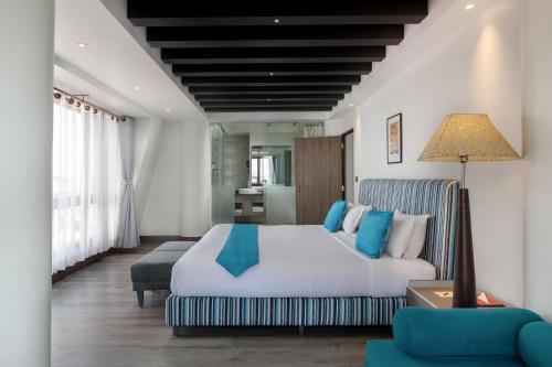 Postel nebo postele na pokoji v ubytování Kathmandu Guest House by KGH Group