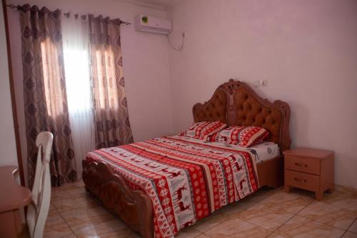 Postel nebo postele na pokoji v ubytování POUANGO Home