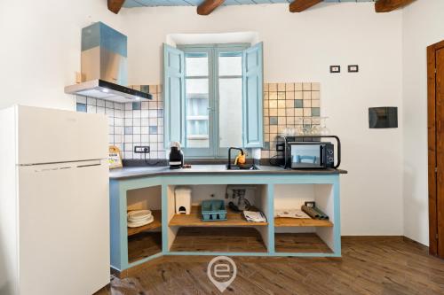 Kuchyň nebo kuchyňský kout v ubytování Albachiara