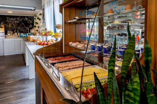 a buffet line with many different types of food at Vranovská pláž - Holiday park in Vranov nad Dyjí