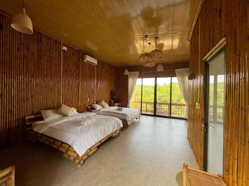 Ένα ή περισσότερα κρεβάτια σε δωμάτιο στο Om Tara Retreat