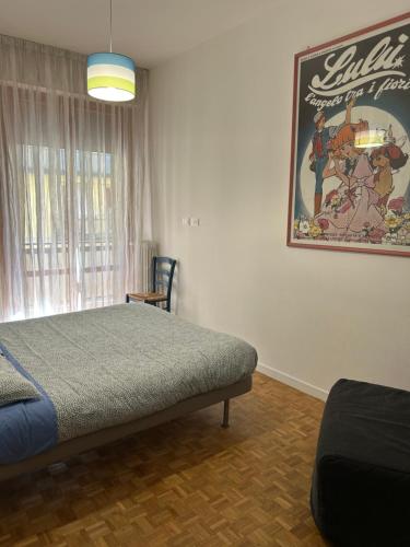 Postel nebo postele na pokoji v ubytování Marie Home Florence