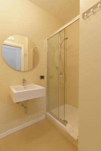 a bathroom with a sink and a shower at Al Postale 17 in Erice