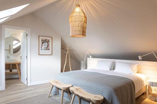 Postel nebo postele na pokoji v ubytování Charming Design House In Montijo With Garden - 45