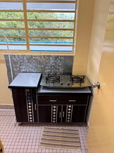 Kuchyň nebo kuchyňský kout v ubytování 3BR Permata Homestay - Ocean Oasis in Port Dickson