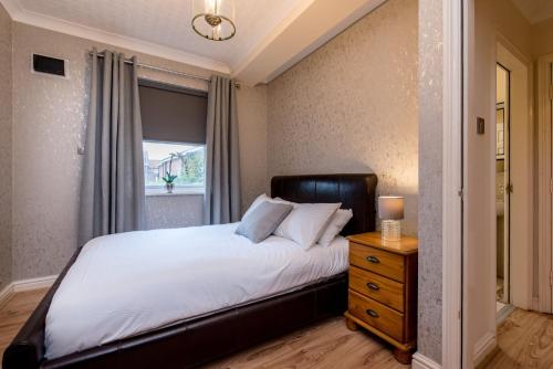 Кровать или кровати в номере Cattle Market View Apartment