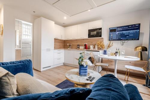 Η κουζίνα ή μικρή κουζίνα στο Le Bertin- cosy appartement Montfermeil