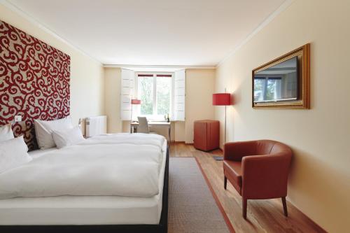 Postel nebo postele na pokoji v ubytování Hotel Weitzer Graz - Centre of Graz