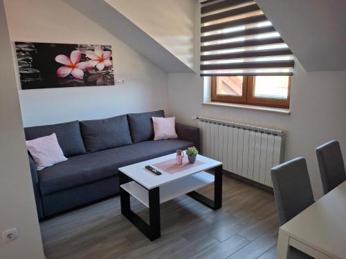 Χώρος καθιστικού στο Apartman OBLAK Ravna gora