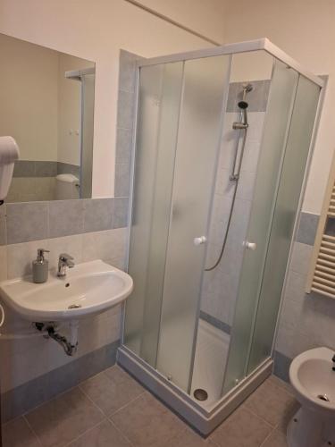 a bathroom with a shower and a sink at Lucazione Turistica in Mestre