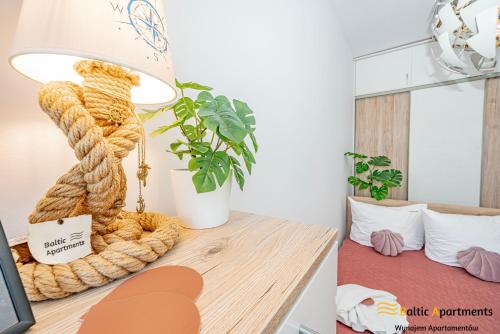 Postel nebo postele na pokoji v ubytování Baltic Apartments - Willa Carmen