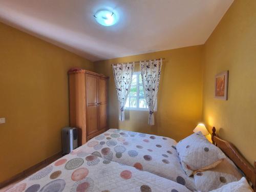 Postel nebo postele na pokoji v ubytování Vista Hermosa 4