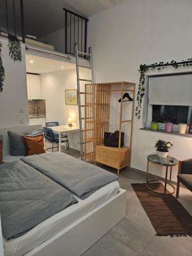 Ένα ή περισσότερα κρεβάτια σε δωμάτιο στο Estelada Boarding Houses - Bogenhausen