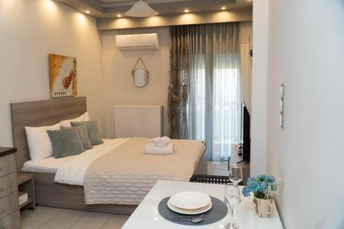 Posteľ alebo postele v izbe v ubytovaní Xenia_Apartments A2