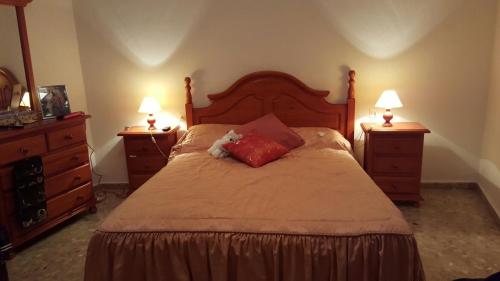 Un pat sau paturi într-o cameră la Casa Trini