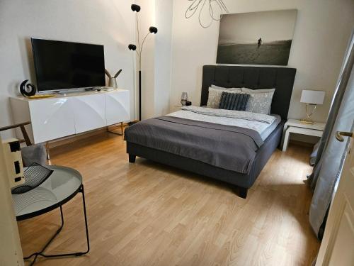 Postel nebo postele na pokoji v ubytování Holiday Apartments Walter