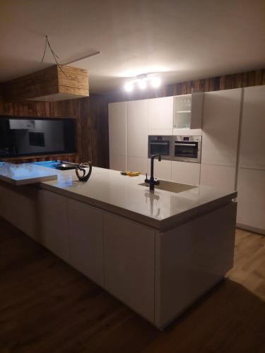 Una cocina o zona de cocina en Le châtelain de Bouillon