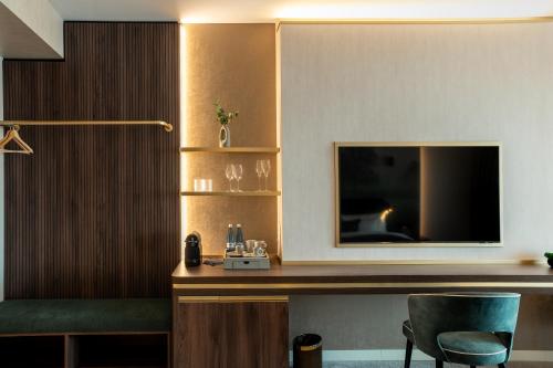 TV a/nebo společenská místnost v ubytování Le Primore Hotel & Spa