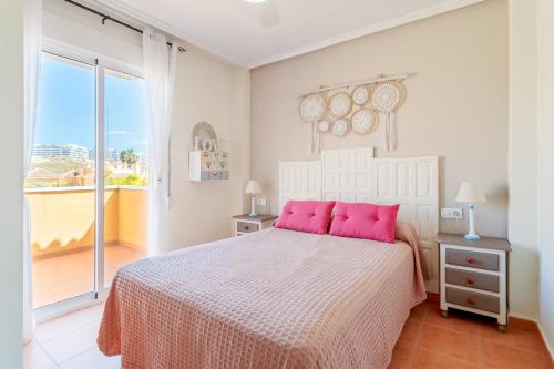 Ένα ή περισσότερα κρεβάτια σε δωμάτιο στο Casa Playa Carabassi