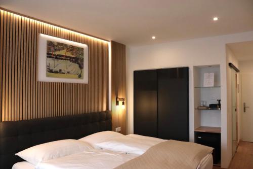 Postel nebo postele na pokoji v ubytování Hotel Europe