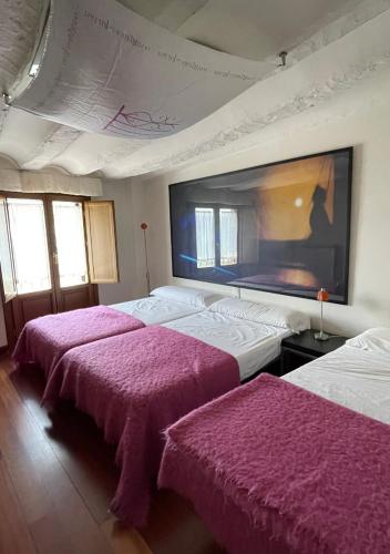 Postel nebo postele na pokoji v ubytování Alojamiento Rural Coliving Sojuela