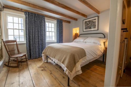 Ένα ή περισσότερα κρεβάτια σε δωμάτιο στο 1 Webster Steps