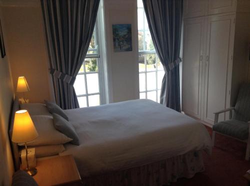 Postel nebo postele na pokoji v ubytování Miramar Guesthouse