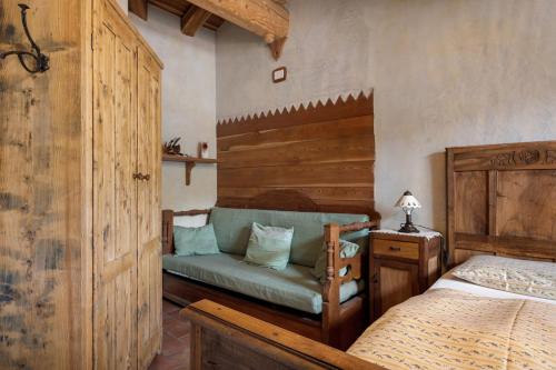 Ένα ή περισσότερα κρεβάτια σε δωμάτιο στο Agriturismo Alpenvidehof