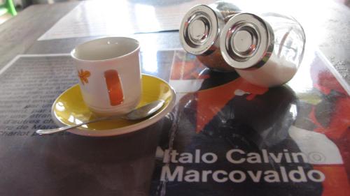 two cups of coffee sitting on a table at Il Mulino di Amleto - Bed and Breakfast letterario in Molfetta