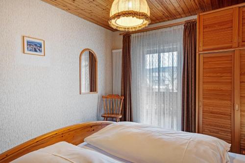 Кровать или кровати в номере Ferienhaus im Grund
