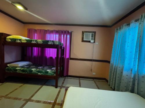 Fotografie z fotogalerie ubytování VisiTours Nook Moalboal Guest House v destinaci Moalboal