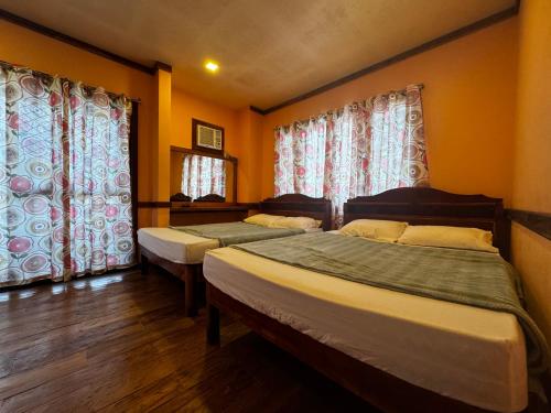 Fotografie z fotogalerie ubytování VisiTours Nook Moalboal Guest House v destinaci Moalboal