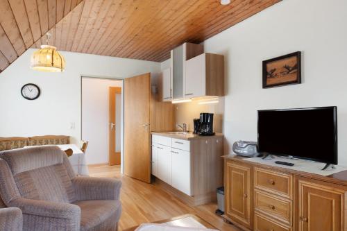 Кухня или мини-кухня в Ferienhaus im Grund
