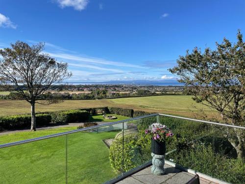 a view from the balcony of a house at Highgrove House Hotel in Loans