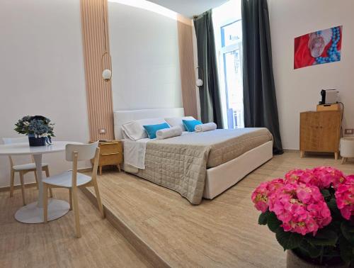Postel nebo postele na pokoji v ubytování O' Vesuvio B & B