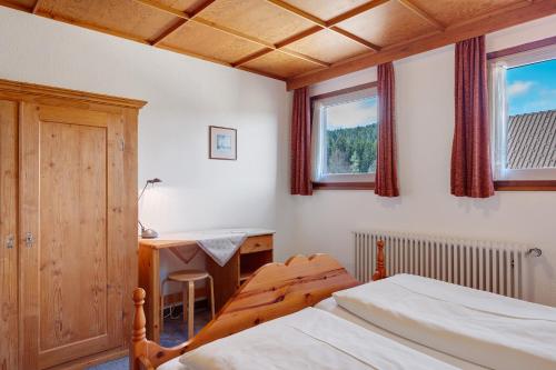 Кровать или кровати в номере Ferienhaus im Grund