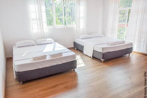 Ένα ή περισσότερα κρεβάτια σε δωμάτιο στο Kandy Green Villa