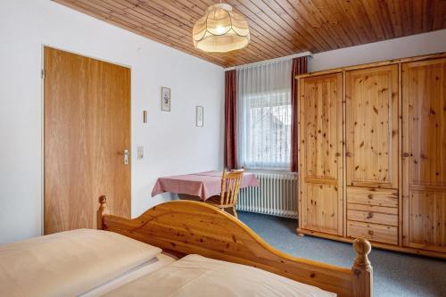 Кровать или кровати в номере Ferienhaus im Grund