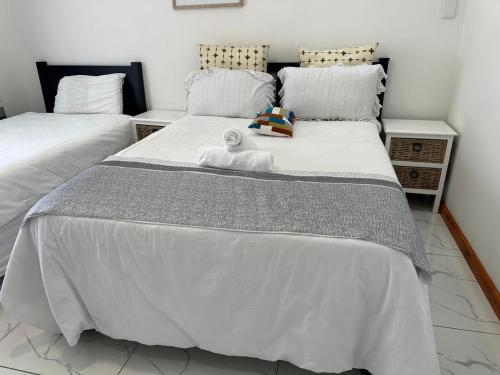 Katil atau katil-katil dalam bilik di MELJAA STAR Guesthouse