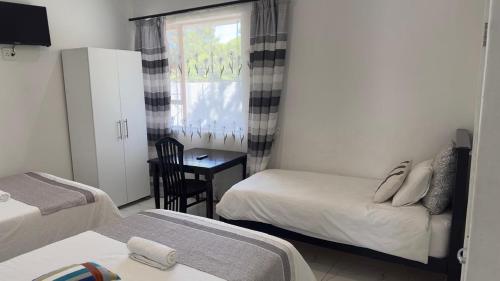 Katil atau katil-katil dalam bilik di MELJAA STAR Guesthouse