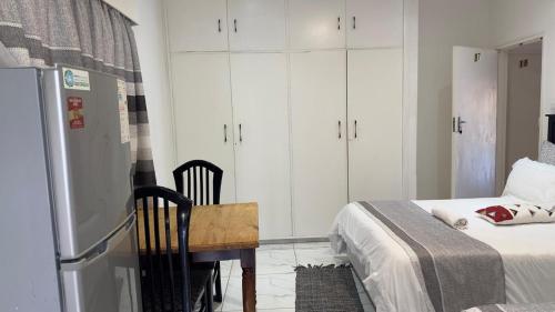 Katil atau katil-katil dalam bilik di MELJAA STAR Guesthouse