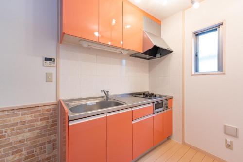 Una cocina o zona de cocina en ｾ-ﾇwest