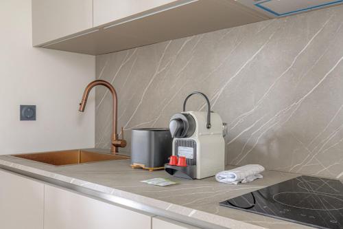 Dapur atau dapur kecil di T2 rénové et confortable à Écully pour 2 personnes